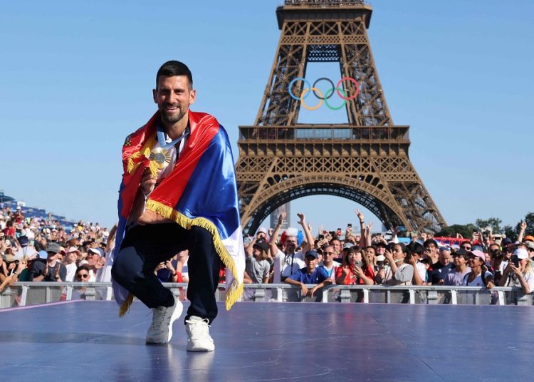 Gold medallist in the men's singles tennis event Serbia's Novak Djokovic poses at the Champions Park at Trocadero during the Paris 2024 Olympic Games in Paris on August 5, 2024. (Photo by Jack GUEZ / AFP)